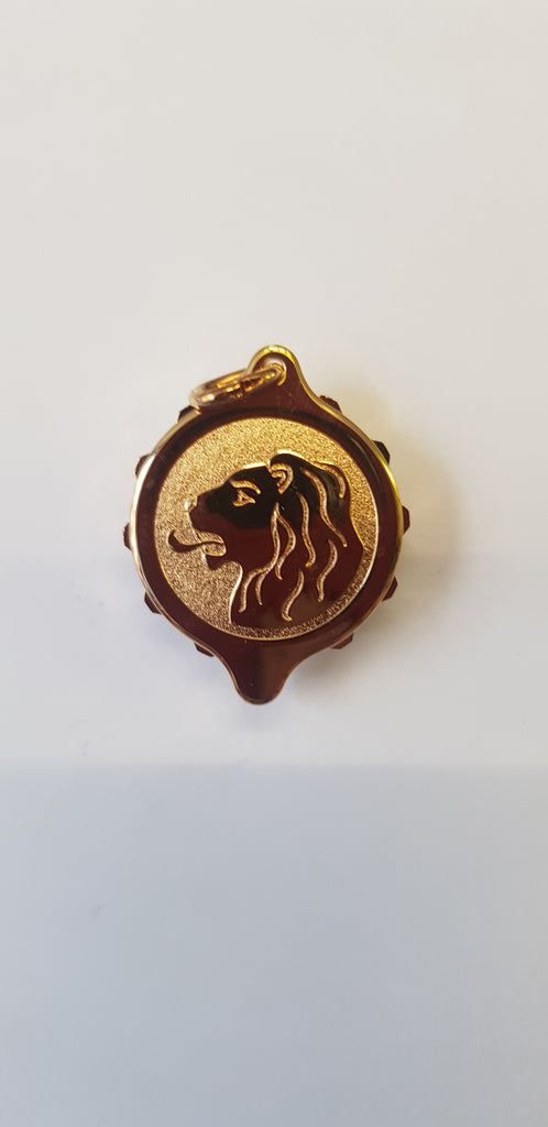 GOLD TONE SOS TALISMAN WITH ZODIAC LEO ON 22